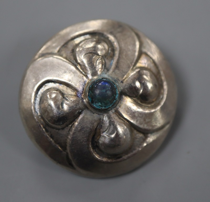 A pre 1932 Georg Jensen 830S and cabochon set circular brooch, design no. 52, 28mm, gross 7 grams.